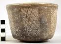 Brown-olla, stick polished design