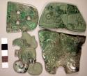 6 fragments of 2 jade serpent heads thin, carved on both sides max. size 57.5 x