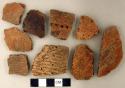 Ceramic, earthenware rim and body sherds, including undecorated, incised, dentate, and cord-impressed designs