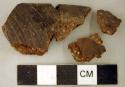 Ceramic, earthenware rim and body sherds, incised; one mended