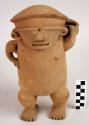 Large figurine whistle, female carrying pot, Period III (exhibit note)