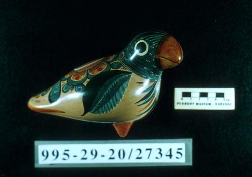 Elaborately painted ceramic parakeet