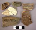 Ceramic rim & body sherds, glazed, red,  white, finger pinched, molded, grooved