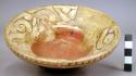 Fragmentary  bowl: white slip, brown & red decoration