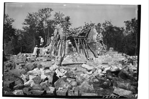 Temple of Warriors. Showing beginning of repair of interior of back wall, lookin