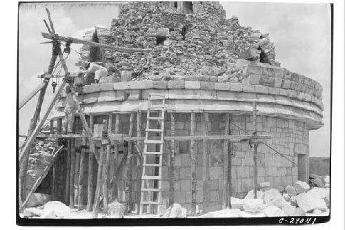 Repair of Cornice E. side of Caracol building.