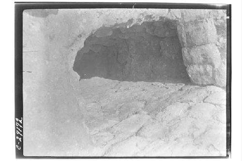 Caracol, pit at S. side lower stairway against the lower terrace.