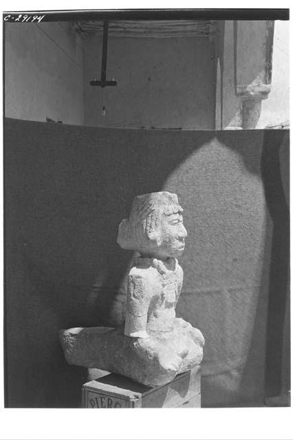 Stone figure, Caracol, above the N. doorway.