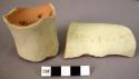 Ceramic neck and rim sherds, red ware with white slip, wheel marked