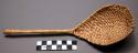 Twined basketry ladle for dipping the mush when serving into the "cup" (cf. 5012