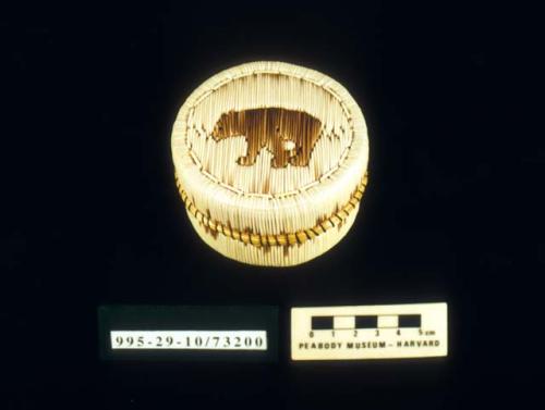 Fully-quilled birch bark basket with lid; bear motif