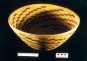 Coiled storage basket of willow with flaring sides