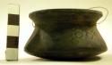 Ceramic, complete vessel, bowl, flanged rim, geometric designs, polished, black.