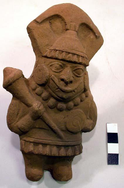 Red minaiture pottery effigy