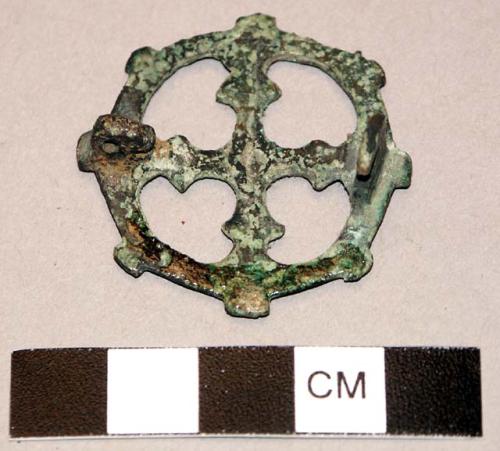 Openwork cruciform pin