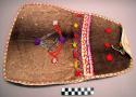 Calico pouch, fronted with young deer-skin; much wool embroidery *