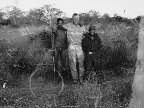 //Ow and Nagani (interpreter for the expedition) standing with John Marshall