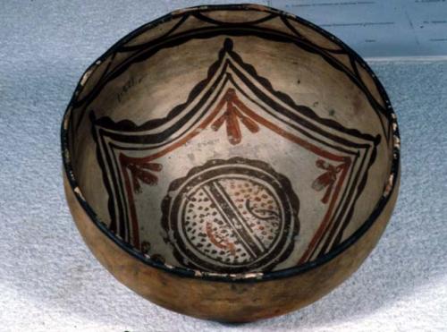 Bowl, polacca polychrome style c. int: curvilinear design; ext: slipped, no desi