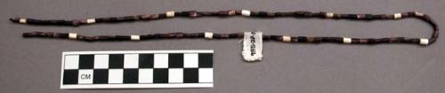 String of purple and white wampum, 1 of 7