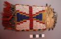 Cheyenne beaded pouch. Rectangular w/ semicircular flap, fringe, and tinkler
