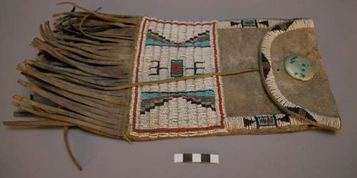 Northern Cheyenne beaded bag made mostly of commercial leather.