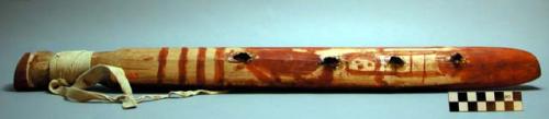 War club of birch wood with wrist loop of buckskin.