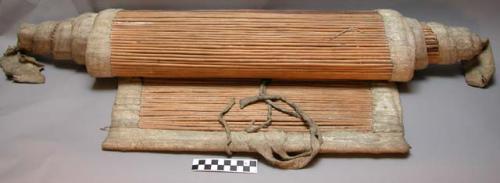 Crow backrest. Mat made from peeled willow sticks edged with bison hide.