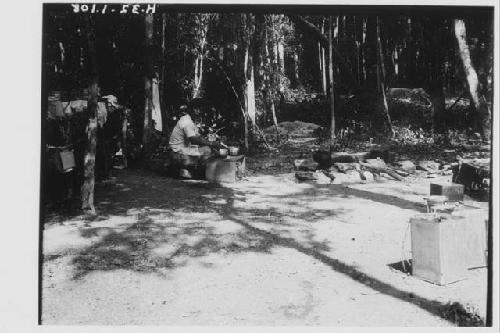 Man cooking in camp kitchen