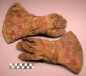 Man's caribou skin mitts. Embroidered with flower designs in colored silk thread