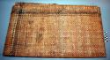Checker mat woven of strips of cedar bark.