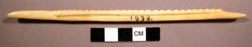 Ivory implement, serrated edge