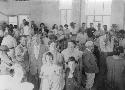 Large group of people at a party in Ghanzi, including Mr. and Mrs. Medgly, Mr. Upton, Mrs. Crail and L. F. Maingard