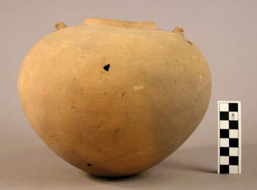 Pottery vessel with two tiny animal heads near rim and eight holes regularly spa