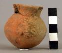 Miniature pottery jar with modelled lug handles and broken neck - Armadillo ware