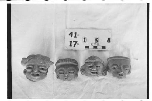 Four Figurine Heads