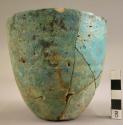 5 pieces of partially reconstructed cup, blue glazed on white frit