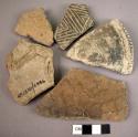 6 decorated pot sherds