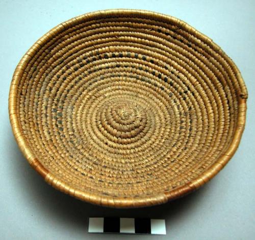 Small coiled built basketry bowl with black designs