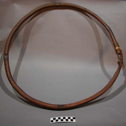 Wooden hoop for hoop game--notched with designs at intervals