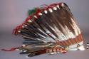 Cheyenne eagle feather headdress. Swept back bonnet, no trail.