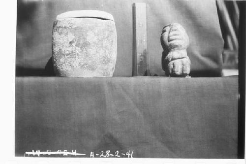 Archaic mudstone figurine and jar in which it was found in altar of Temple E-II,