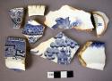 China sherds; transfer patterns; blue & whtie, some willoware. Rims, body & basa