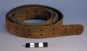 Belt, leather, perforated, fastened with metal clasp, end torn, + piece of belt