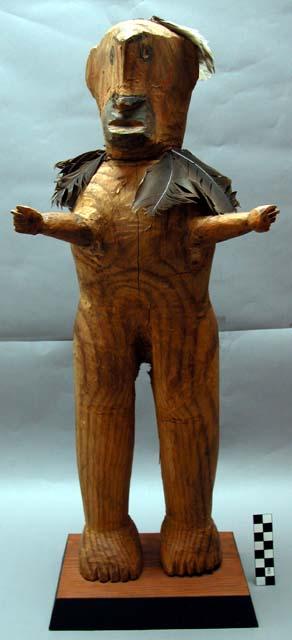 Effigy of pock-san-e (place in meadow); chuck-e-yok (little boy)