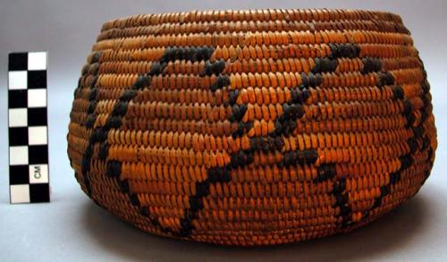 California bundle coiled basket, possibly Mission. Deep bowl shape w/ incurving