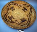 Large tray basket, coiled. Made of bear grass and devil's claw.
