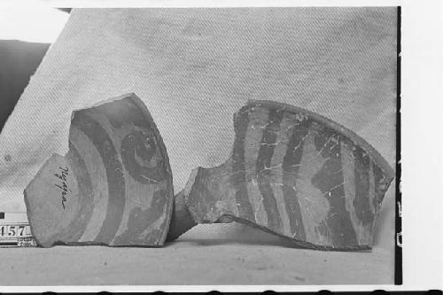 Two Fragments of Tripodal Pottey Bowls