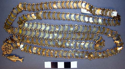 Gold necklace of plates and fish-like fob - modern