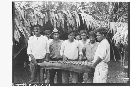 Workmen with Home made Marimba