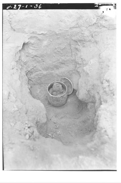 Idol. altar of Temple III, jar uncovered, turned around